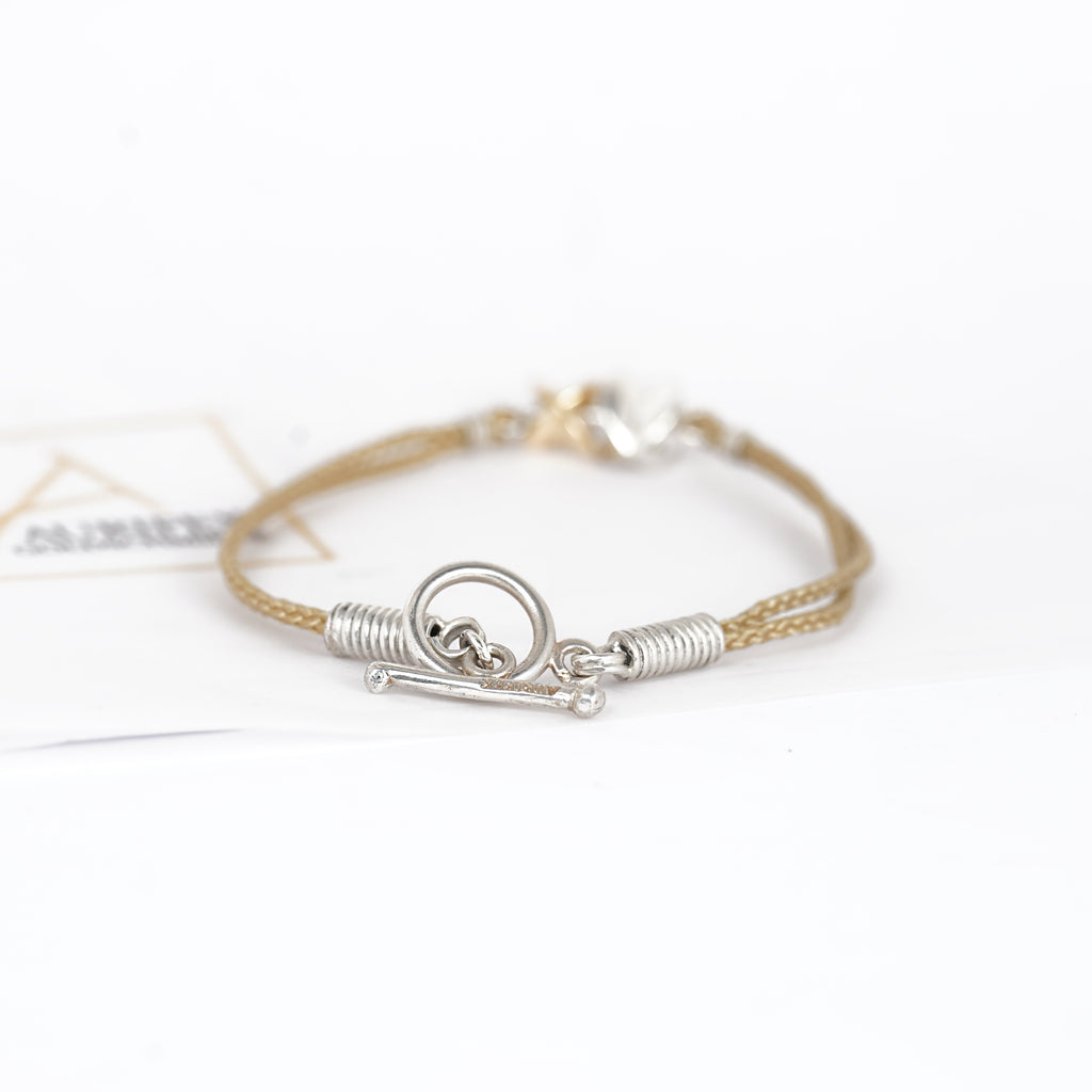 Aurifex Goldschmiede Koblenz Armband aus der Kollektion Feine Form mit Sternen in Silber mit Gelbgold