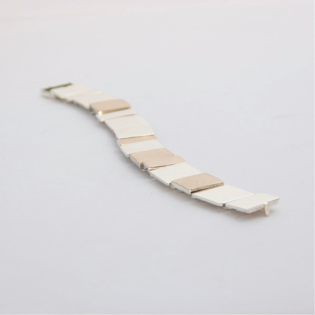 Aurifex Goldschmiede Koblenz Armband aus der Kollektion Flächen in Silber mit Flächen aus Gelbgold