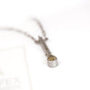 Aurifex Goldschmiede Koblenz Halsschmuck aus der Kollektion Diamant in Platin mit grünem Diamanttropfen