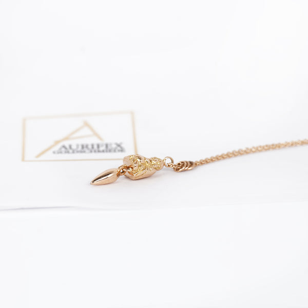 Aurifex Goldschmiede Koblenz Halsschmuck aus der Kollektion Symbolique in Rotgold mit Buddha