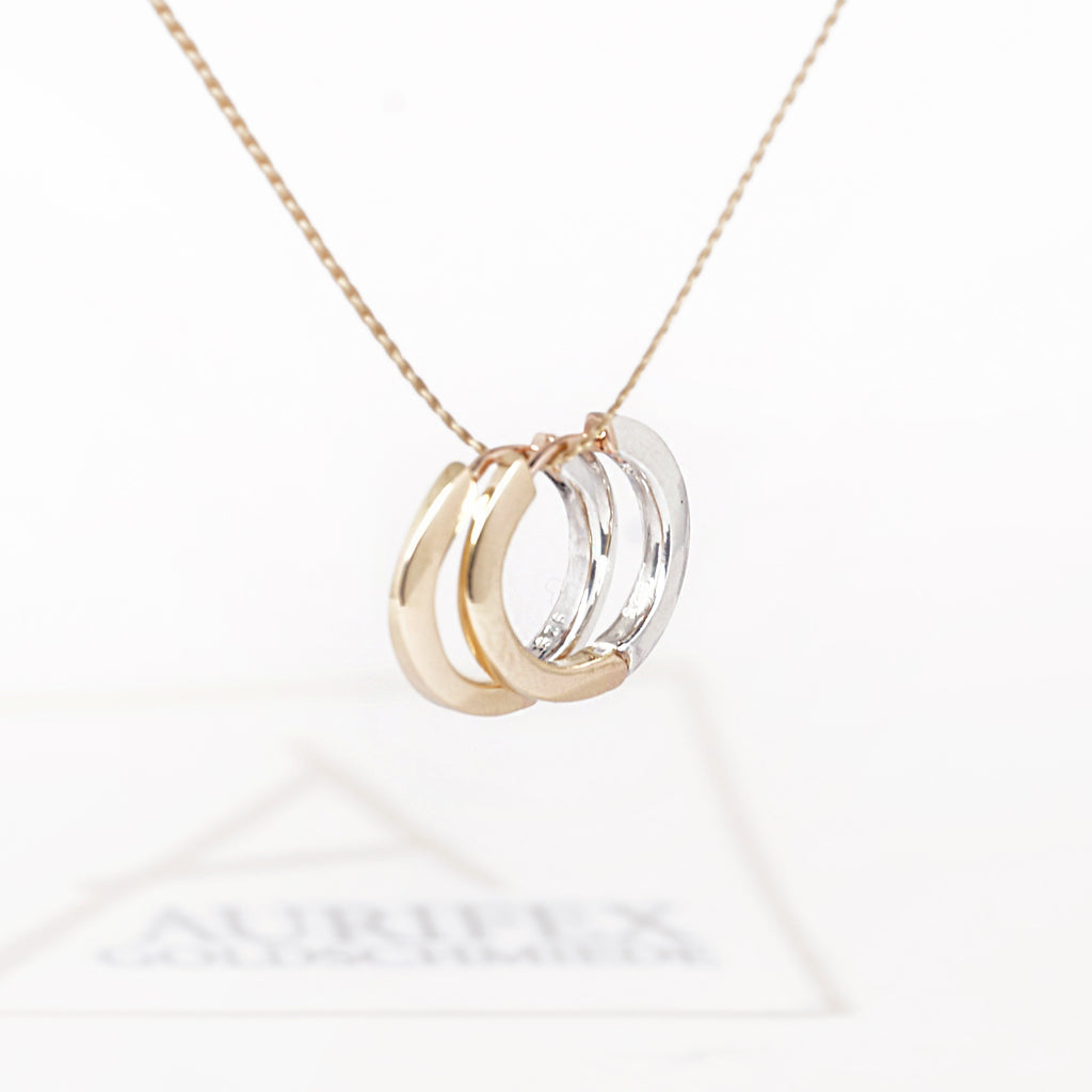 Aurifex Goldschmiede Koblenz Creolen aus der Kollektion PUR gefertigt in Silber und Gelbgold