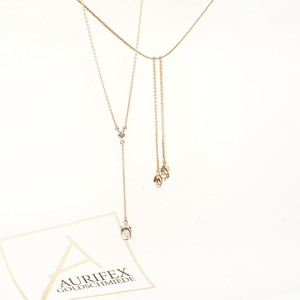 Aurifex Goldschmiede Koblenz Halsschmuck aus der Kollektion Diamant in Rotgold mit Diamant Briolett und Brillant